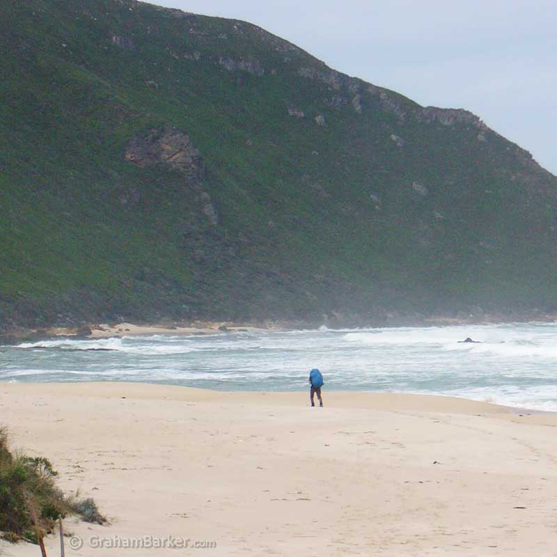 A hiker on the Bibbulmun Track, which crosses Conspicuous Beach, Western Australia