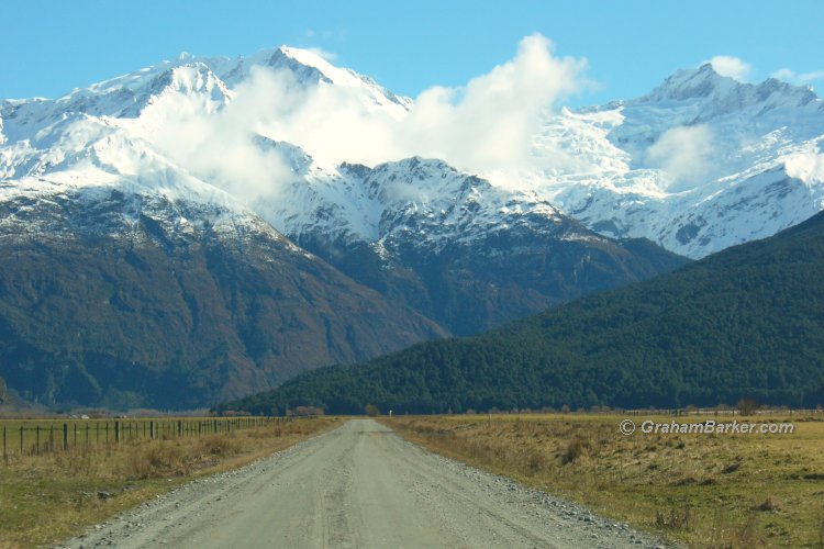 Road through farmland up Matukituki Valley, New Zealand