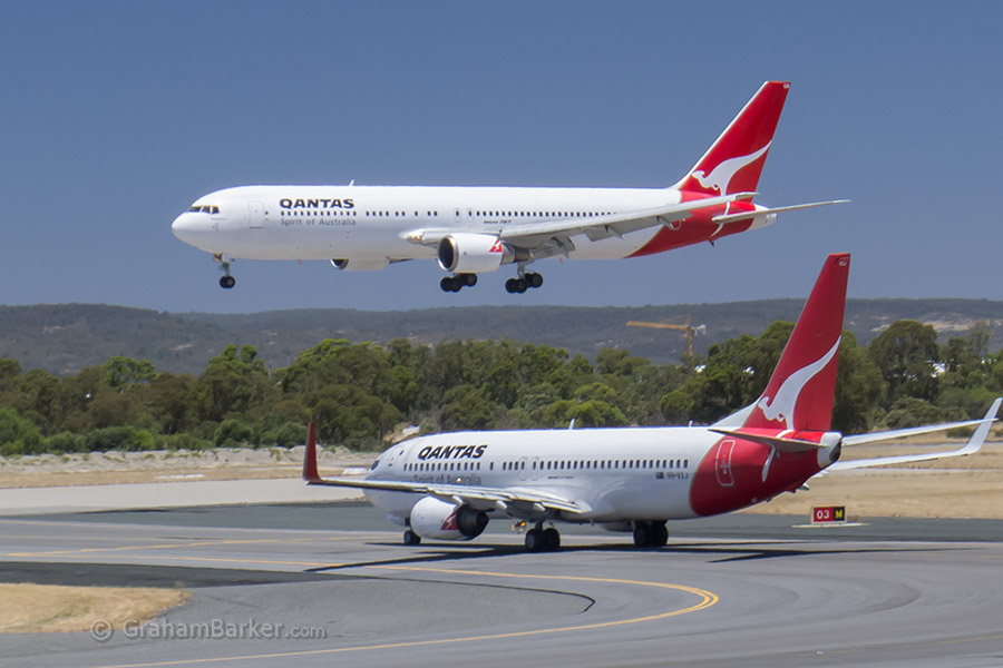 Qantas 737 waiting for a 767 to land, Perth Airport