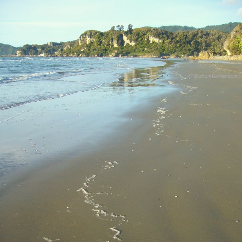 View of Pohara Beach, New Zealand, from in front of the holiday park