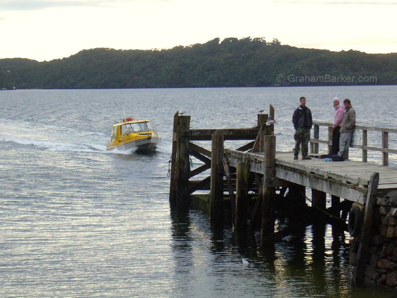 Coming to take us away - a Stewart Island water taxi, Ulva Island, New Zealand