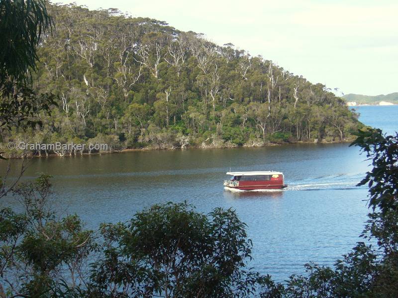 The WOW Wilderness Ecocruise boat in the channel between the Walpole and Nornalup inlets, Western Australia